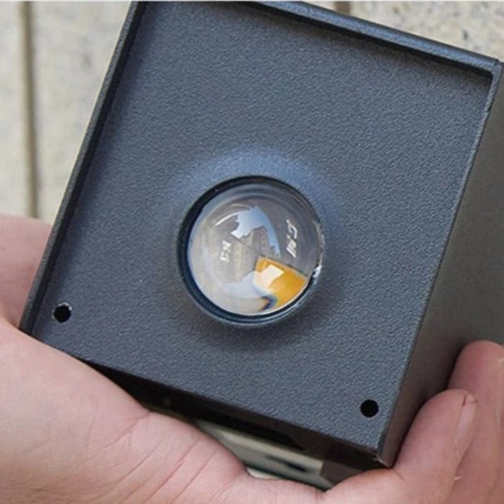 "Solar LED outdoor wall light illuminating up and down; eco-friendly, weather-resistant, elegant design; multiple light color
