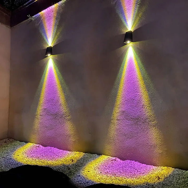"Solar LED outdoor wall light illuminating up and down; eco-friendly, weather-resistant, elegant design; multiple light color