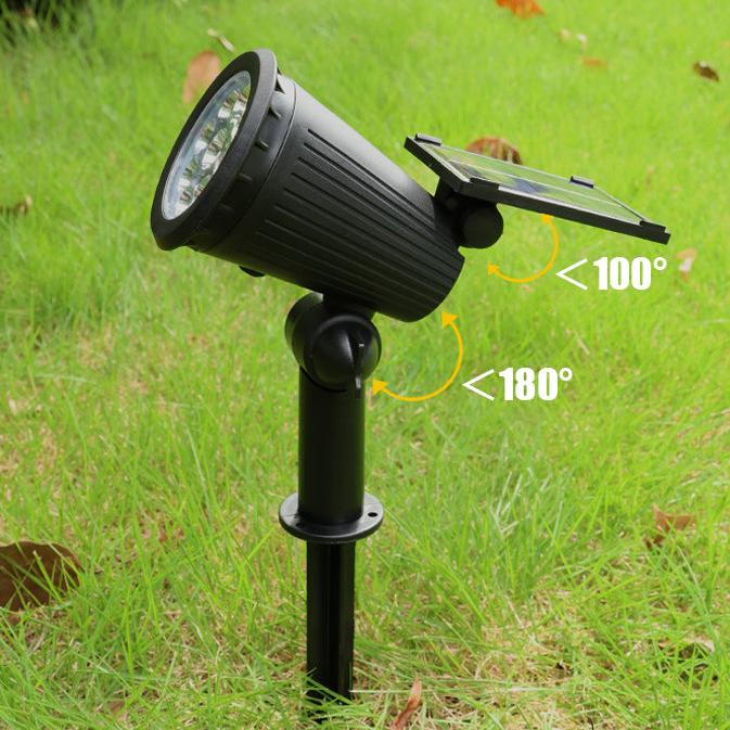 Solar-powered LED garden spotlight with sleek black design, adjustable head, and vibrant RGB lighting for outdoor use.