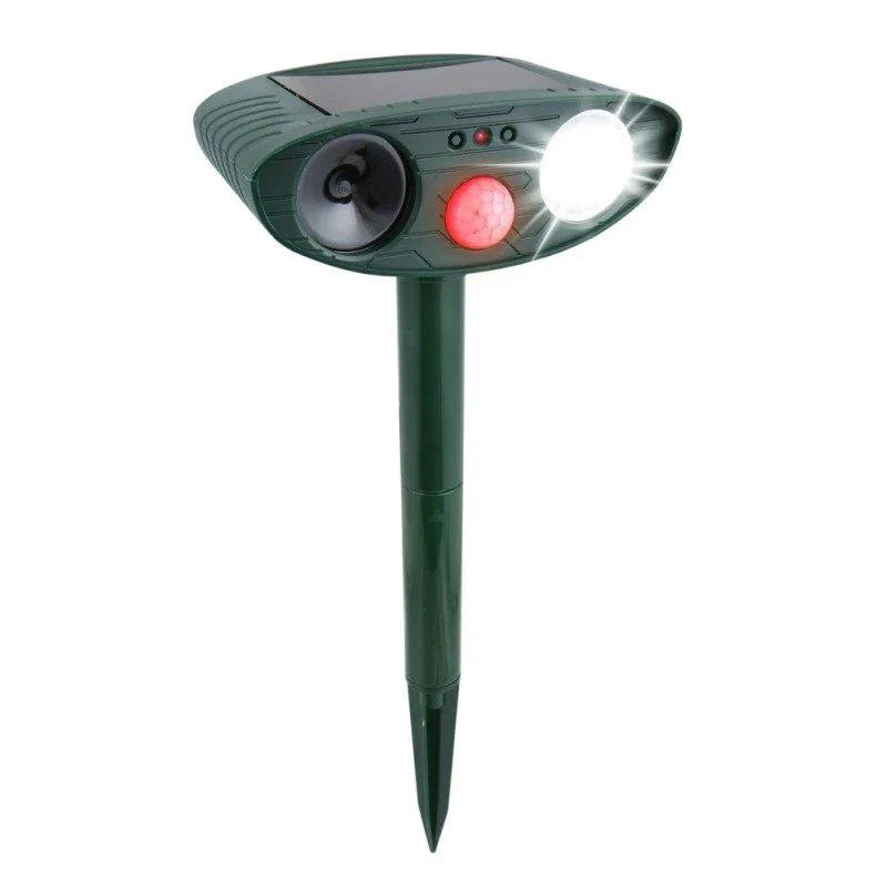 "Solar-powered ultrasonic deer repeller in use, eco-friendly yard protection, green technology for garden security."
