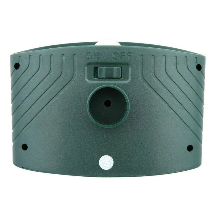 "Solar-powered ultrasonic deer repeller in use, eco-friendly yard protection, green technology for garden security."