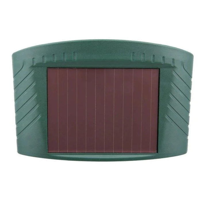 "Solar-powered ultrasonic deer repeller in use, eco-friendly yard protection, green technology for garden security."