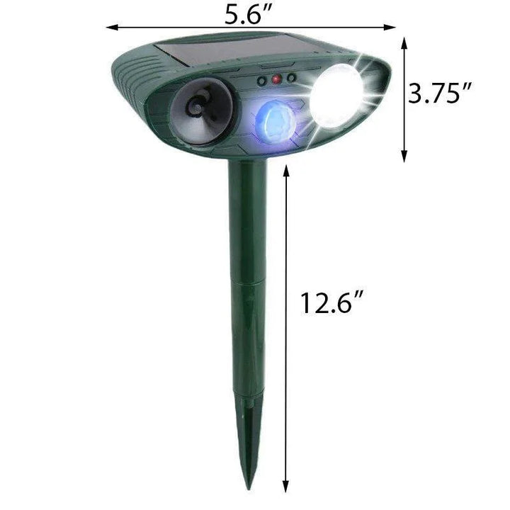 "Solar-powered ultrasonic deer repeller in use, eco-friendly yard protection, green technology for garden security."