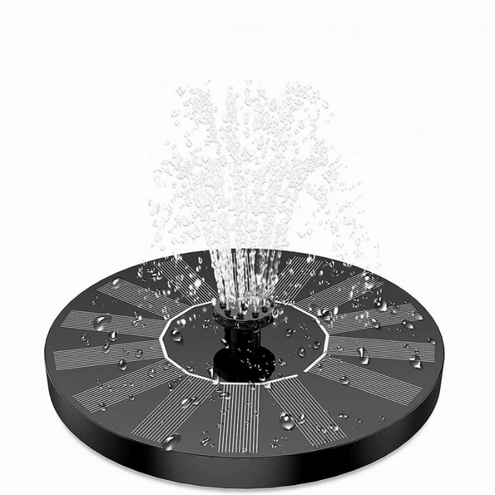 "Solar-powered water feature with interchangeable nozzles in a serene garden setting, enhancing outdoor ambiance."
