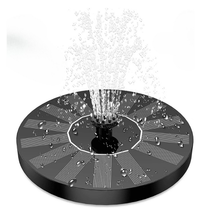 "Solar-powered water feature with interchangeable nozzles in a serene garden setting, enhancing outdoor ambiance."