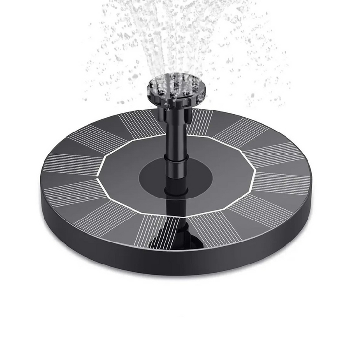 "Solar-powered water feature with interchangeable nozzles in a serene garden setting, enhancing outdoor ambiance."