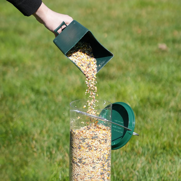 Squirrel proof metal bird feeder, heavy-duty design, stylish and functional for gardens, resists squirrels and weather.