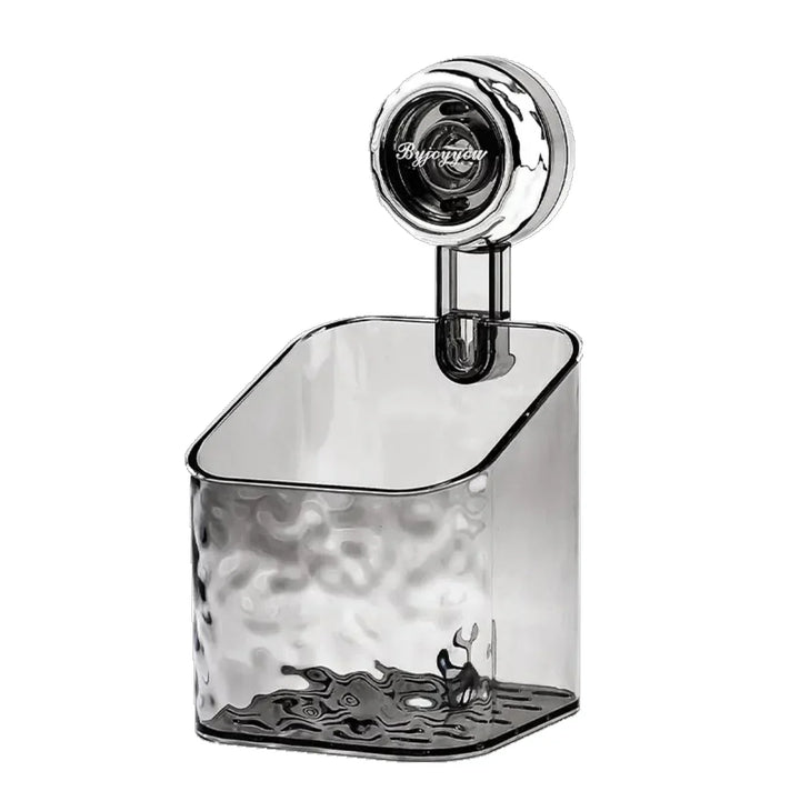 "Transparent no-drill bathroom caddy with strong suction cups, mounted on wall, for organizing toiletries and kitchen tools."