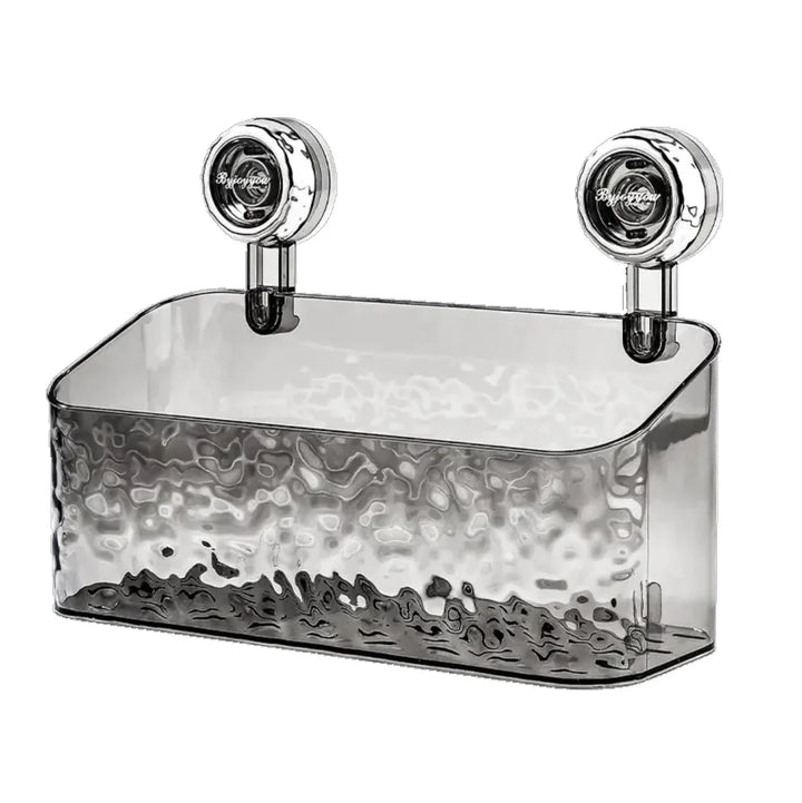 "Transparent no-drill bathroom caddy with strong suction cups, mounted on wall, for organizing toiletries and kitchen tools."