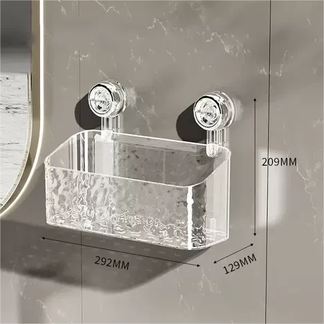 "Transparent no-drill bathroom caddy with strong suction cups, mounted on wall, for organizing toiletries and kitchen tools."