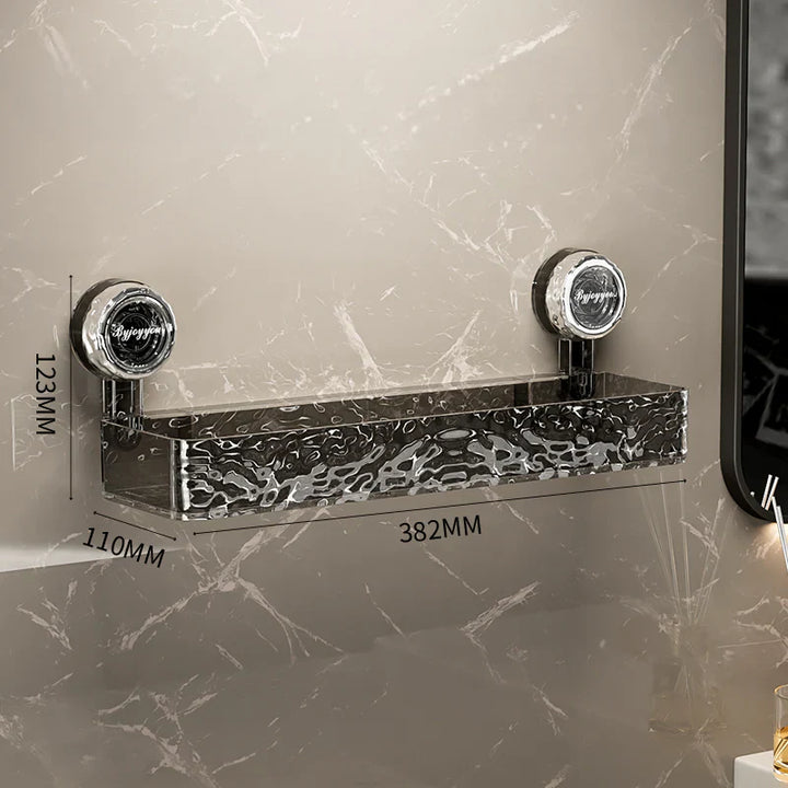 "Transparent no-drill bathroom caddy with strong suction cups, mounted on wall, for organizing toiletries and kitchen tools."