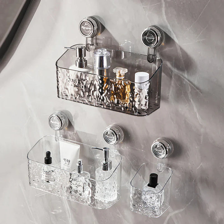 "Transparent no-drill bathroom caddy with strong suction cups, mounted on wall, for organizing toiletries and kitchen tools."