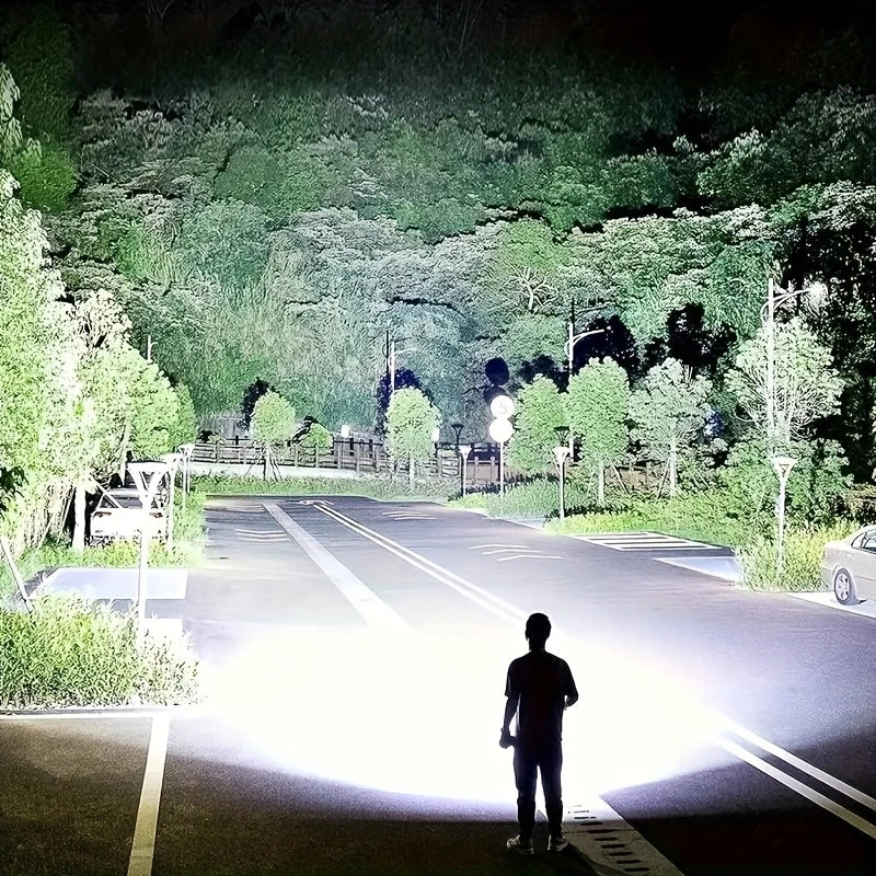 "Ultra-Bright LED tactical flashlight emitting 100,000 lumens; waterproof, compact design ideal for outdoor use."