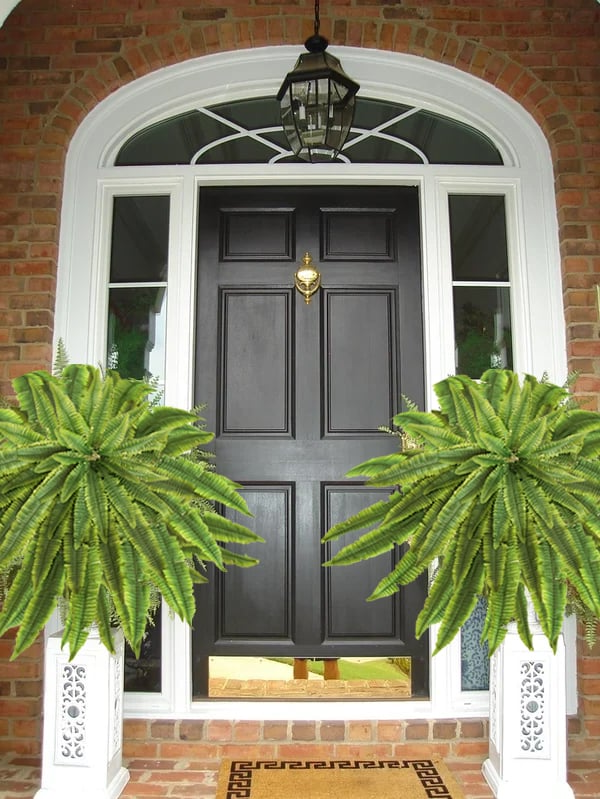 "UV-resistant faux Boston fern, lush greenery for outdoor décor, detailed realistic leaves, ideal for gardens and patios."