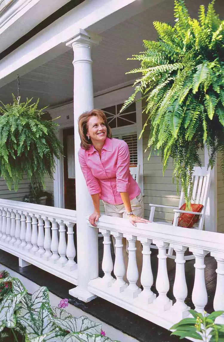 "UV-resistant faux Boston fern, lush greenery for outdoor décor, detailed realistic leaves, ideal for gardens and patios."
