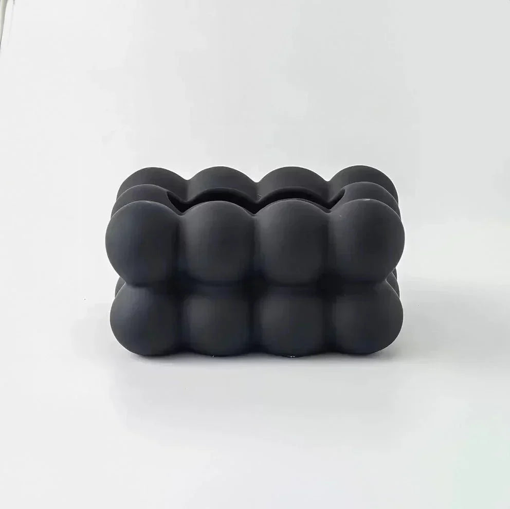 Whimsical ceramic tissue box with bubble design, modern home decor, premium porcelain, fits bedrooms and living rooms.