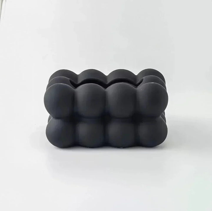 Whimsical ceramic tissue box with bubble design, modern home decor, premium porcelain, fits bedrooms and living rooms.