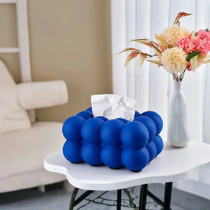 Whimsical ceramic tissue box with bubble design, modern home decor, premium porcelain, fits bedrooms and living rooms.