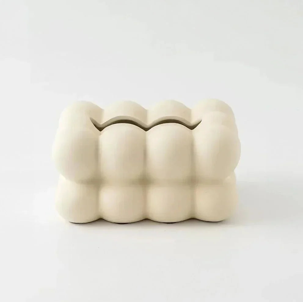 Whimsical ceramic tissue box with bubble design, modern home decor, premium porcelain, fits bedrooms and living rooms.