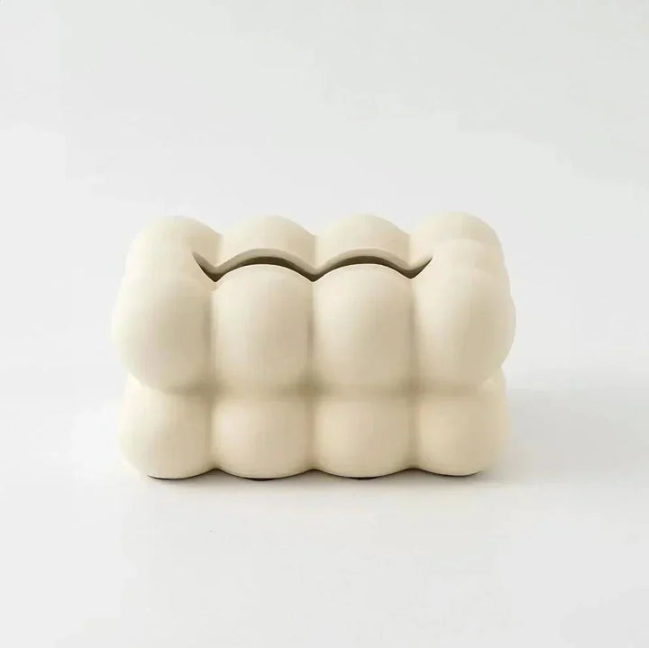 Whimsical ceramic tissue box with bubble design, modern home decor, premium porcelain, fits bedrooms and living rooms.