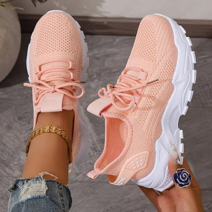 Women's grey orthopedic sneakers with shock-absorbing soles, non-slip, breathable design for comfort and stylish support.