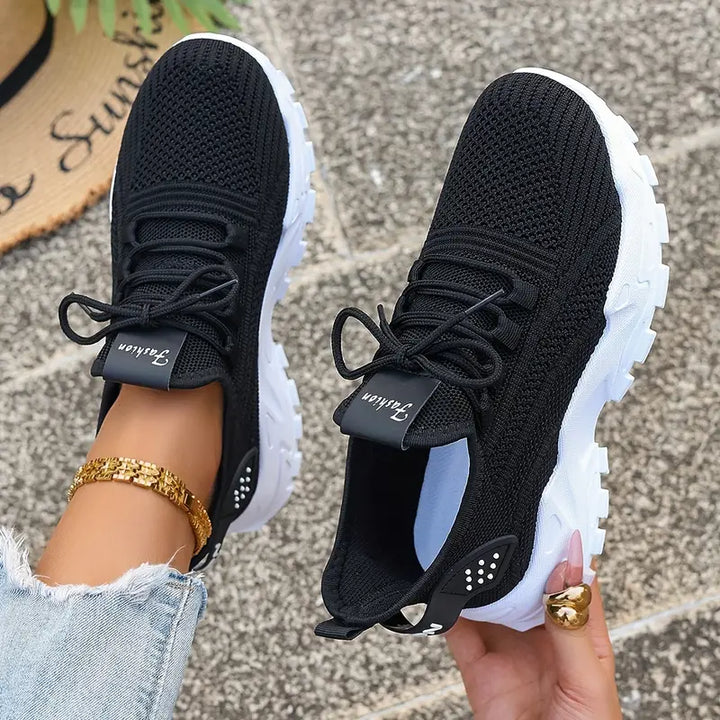 Women's grey orthopedic sneakers with shock-absorbing soles, non-slip, breathable design for comfort and stylish support.
