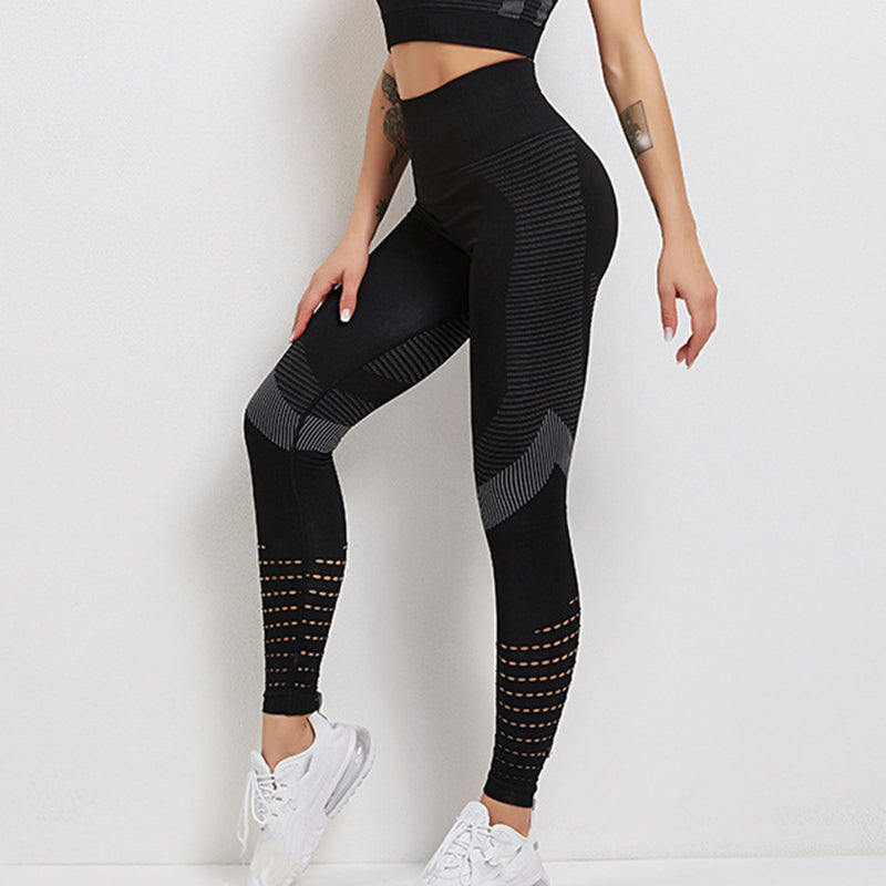 "Women's high-waisted sport leggings, sculpting fit, black color, side view, enhances figure, perfect for workouts."
