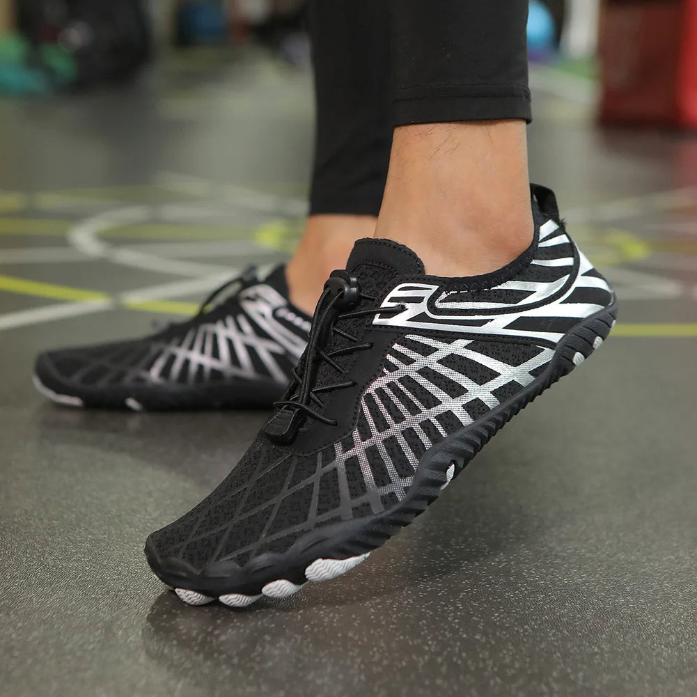 Women's quick-dry aqua shoes with non-slip sole, blue color, breathable mesh fabric, lightweight and sleek design.