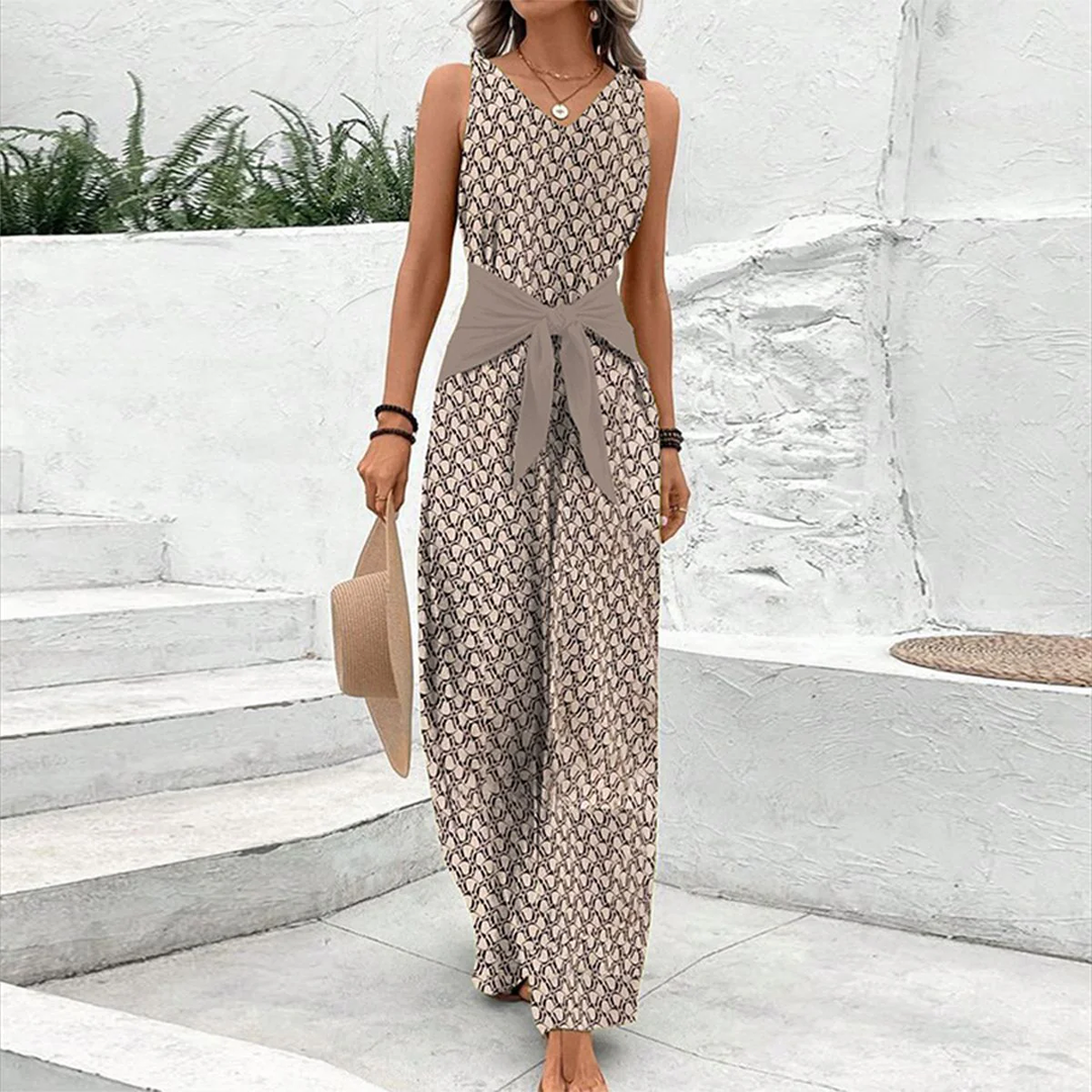 Women's sleeveless V-neck jumpsuit with adjustable waist, lightweight fabric, ideal for warm days, versatile and chic.